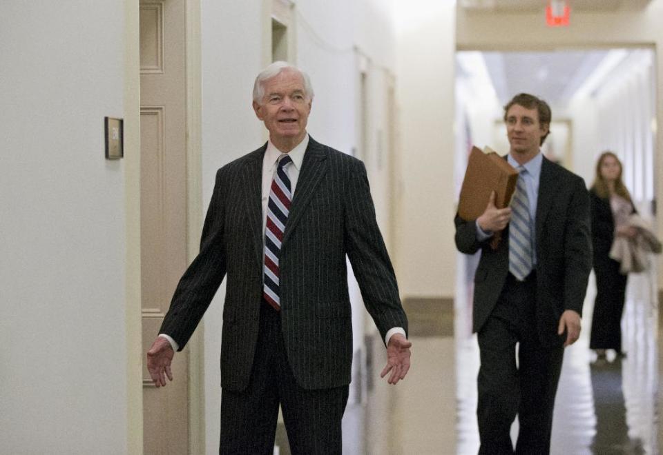 FILE - This Dec. 4, 2013 file photo shows Sen. Thad Cochran, R-Miss. walking on Capitol Hill in Washington. The South, where President Barack Obama and his party have struggled for years, will be Democrats’ toughest battleground in the 2014 fight for control of the Senate. A trio of incumbents must face the consequences of having voted for Obama’s signature health care law, but first Republicans must settle primaries in several states, including a challenge to Minority Leader Mitch McConnell. (AP Photo/J. Scott Applewhite, File)