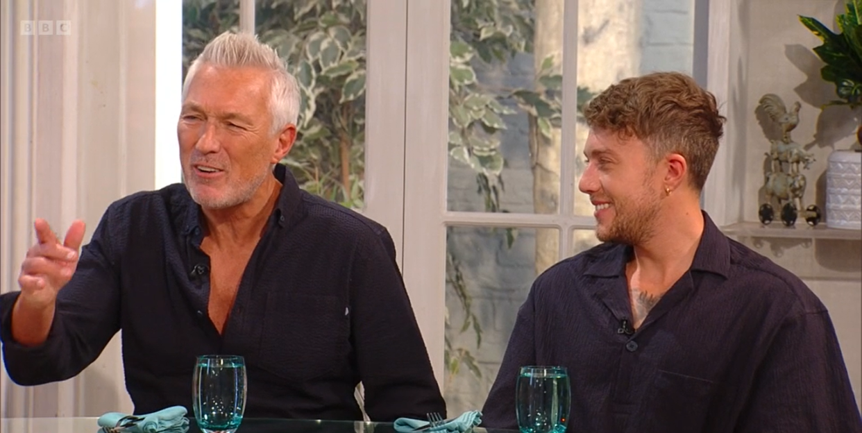 martin and roman kemp on saturday kitchen, wearing similar dark coloured shirts