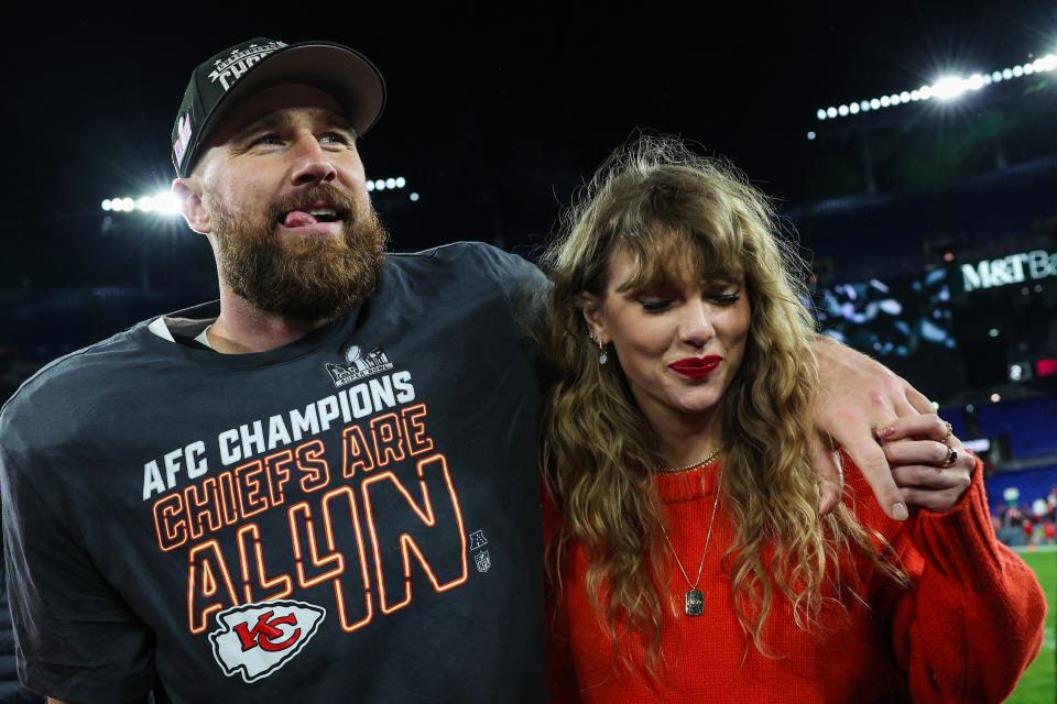 BALTIMORE, MARYLAND - JANUARY 28: Travis Kelce #87 of the Kansas City Chiefs (L) celebrates with Taylor Swift after defeating the Baltimore Ravens in the AFC Championship Game at M&T Bank Stadium on January 28, 2024 in Baltimore, Maryland.  (Photo by Patrick Smith/Getty Images)