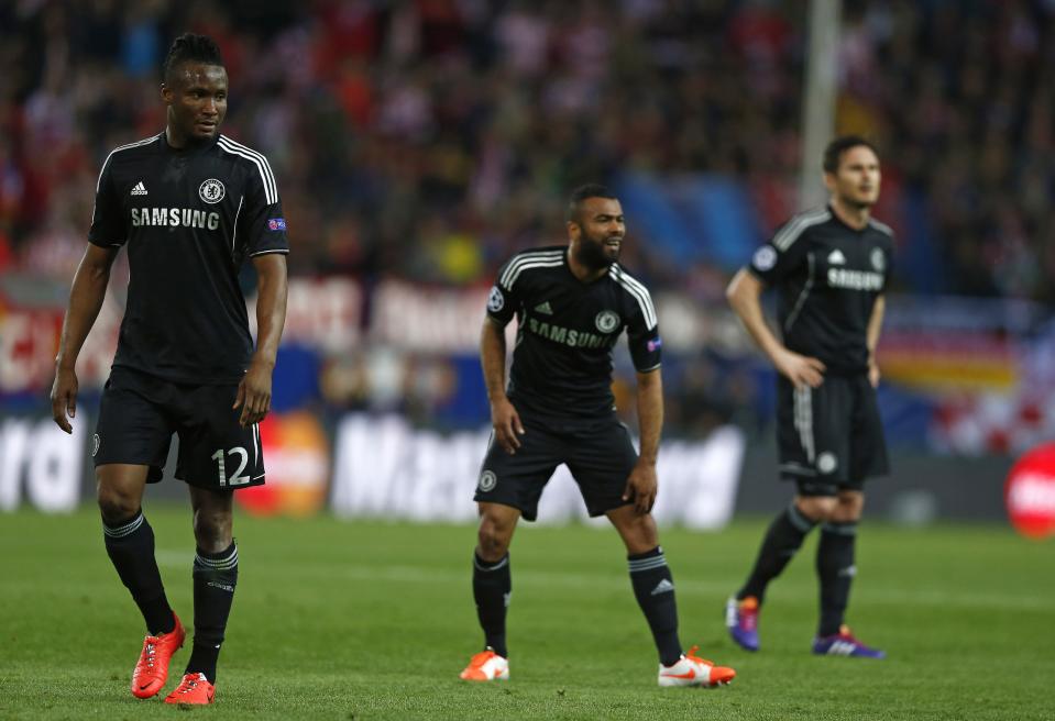 Chelsea players from left: John Obi Mikel, Ashley Cole and Frank Lampard line up during the Champions League semifinal first leg soccer match between Atletico Madrid and Chelsea at the Vicente Calderon stadium in Madrid, Spain, Tuesday, April 22, 2014. (AP Photo/Andres Kudacki)