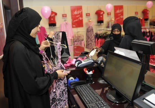 Saudi women shop at a lingerie store in Jeddah. Women hit back at protests from the kingdom's top clerics with a campaign on Facebook called "Enough Embarrassment."