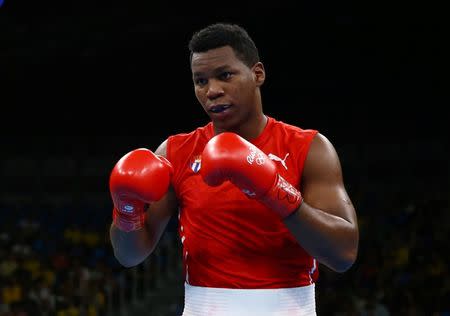 2016 Rio Olympics - Boxing - Preliminary - Men's Super Heavy (+91kg) Round of 16 Bout 161 - Riocentro - Pavilion 6 - Rio de Janeiro, Brazil - 13/08/2016. Lenier Pero (CUB) of Cuba competes. REUTERS/Peter Cziborra