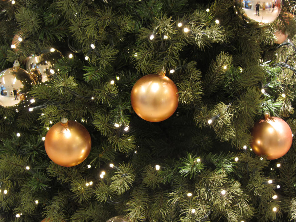 Customers can choose from pre-lit and unlit artificial trees. (Getty Images) 