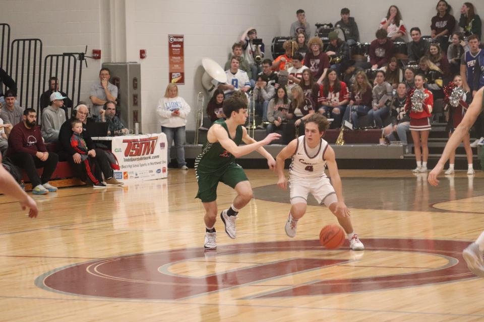 Genoa's Ryan Routson handles the ball.