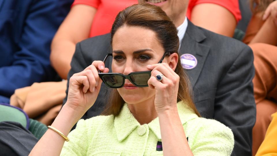 A peek over her sunglasses moment