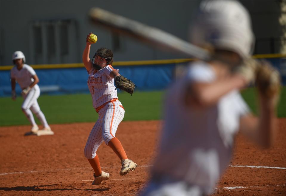 Lincoln Park Academy pitcher Makayla Megnauth (center) fires a fast pitch to John Carroll in the 3rd inning at John Carroll High School on Tuesday, March 12, 2024, in Fort PIerce. Jphn Carrol won 11-0.