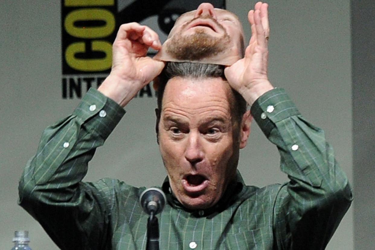 Snooping: Bryan Cranston whipped off his mask to hundreds of startled fans in 2013: Kevin Winter/Getty Images