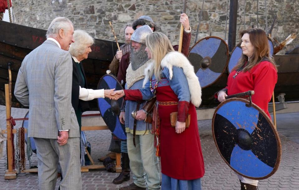 The prince and duchess watched a Viking re-enactment on their arrival in Waterford (Brian Lawless/PA) (PA Wire)
