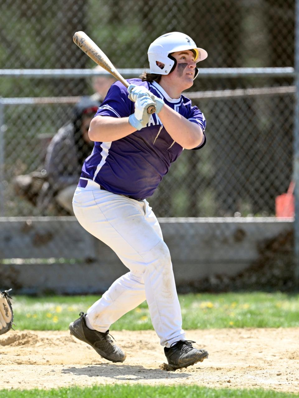 Luca Finton of Bourne drives the ball deep in center for a triple against Wareham on April 21, 2023.