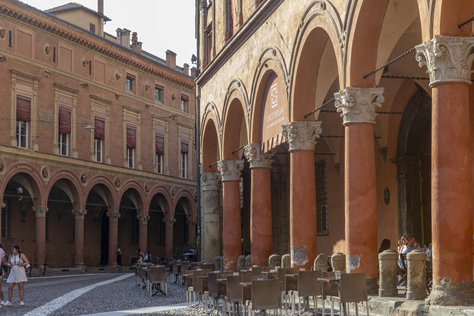 A view of Bologna's porticoes in Bologna, Italy, Wednesday, July 28, 2021. Bologna's 12th-century porticoes, still part of the city's everyday life, have been added to the World Heritage List. At a meeting in China on Wednesday, the World Heritage Committee of UNESCO, the U.N. culture agency, inscribed the porticoes on the prestigious list. The addition raises to 58 the number of Italian sites on the list. (Guido Calamosca/LaPresse via AP)