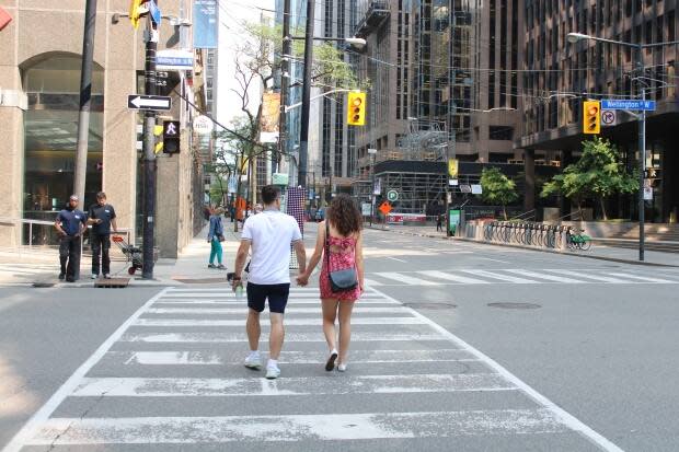 More than 500 signals have been installed in Toronto that give pedestrians a five-second head-start to cross before vehicles are permitted to enter the intersection.   (Yasmine Ghania/CBC - image credit)