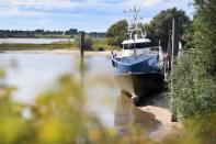 A view of a ship that has run dry at the harbour due to the low water level in the Rhine River in Lobith