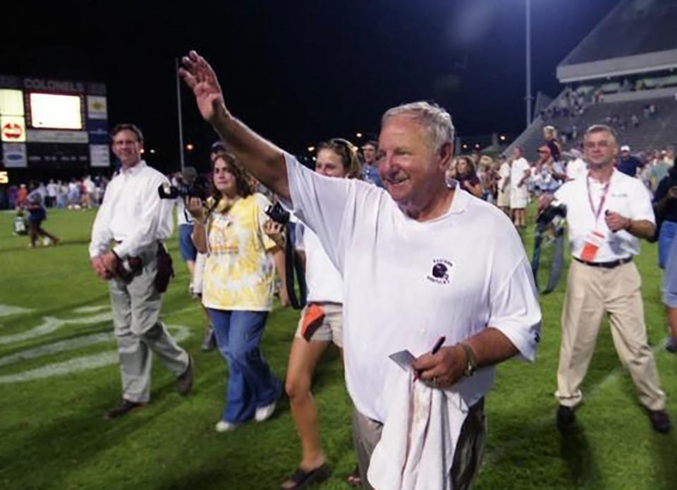 Former Eastern Kentucky football coach Roy Kidd, who died Tuesday, walks off the field.