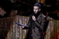 Calvin Harris with his award for British Producer at the Brit Awards at the O2 Arena in London, Britain, February 20, 2019. REUTERS/Hannah McKay