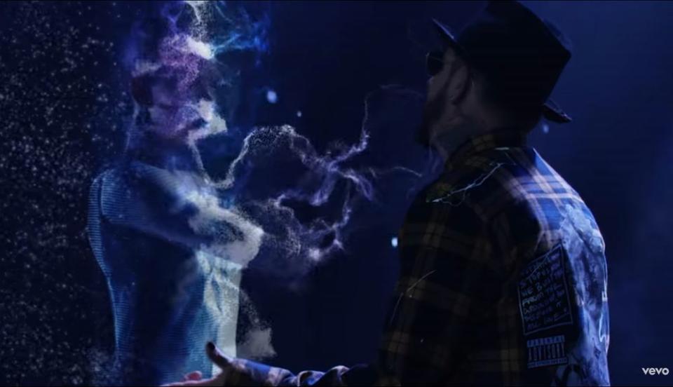 A.J. McLean does his best to serenade what appears to be a hologram of a very attractive woman