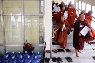 Buddhist monks leave the annual meeting of the nationalist group Buddha Dhamma Parahita Foundation, previously known as Ma Ba Tha in Yangon