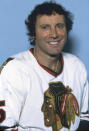 FILE - In this 1984, file photo, Chicago Blackhawks goalie Tony Esposito poses for a photo in Chicago. Esposito, a Hall of Fame goaltender who played almost his entire 16-year career with the Blackhawks, has died following a brief battle with pancreatic cancer, the team announced Tuesday, Aug. 10, 2021. He was 78. (AP Photo, File)