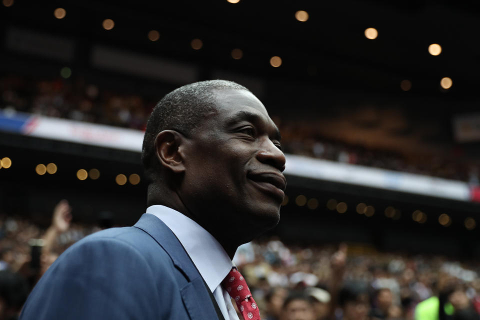 SAITAMA, JAPAN - OCTOBER 10: NBA Legend Dikembe Mutombo enters the court prior to the preseason game between Toronto Raptors and Houston Rockets at Saitama Super Arena on October 10, 2019 in Saitama, Japan. NOTE TO USER: User expressly acknowledges and agrees that, by downloading and/or using this photograph, user is consenting to the terms and conditions of the Getty Images License Agreement. (Photo by Takashi Aoyama/Getty Images)