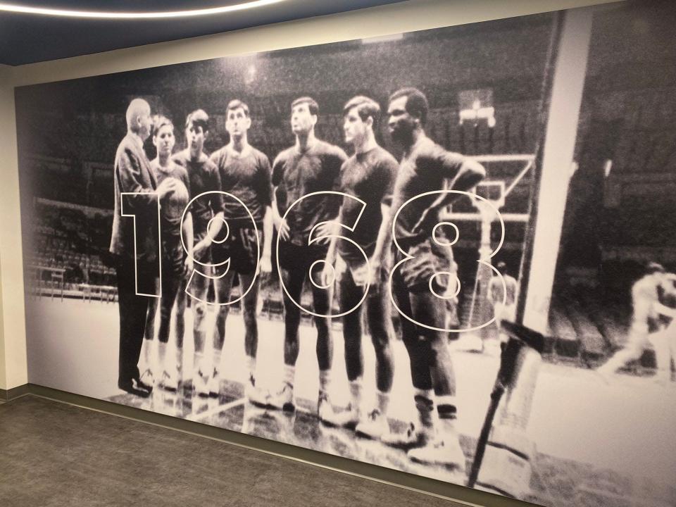 A mural at Saint Peter&#39;s Run Baby Run arena commemorating the 1968 Peacocks team.