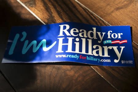 An "I'm Ready for Hillary" sticker lays on a table during the "Ready for Hillary" rally in Manhattan, New York April 11, 2015. REUTERS/Darren Ornitz