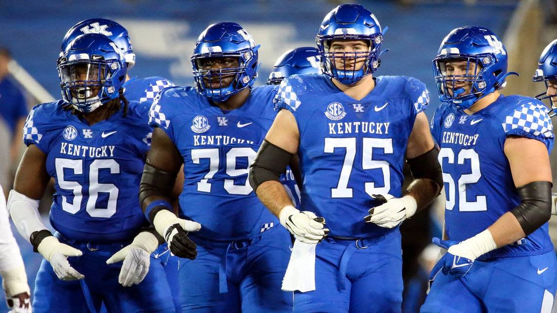 From left, Kentucky offensive tackle Deondre Buford (56), guard Tashawn Manning (79), center Eli Cox (75) and guard Jager Burton (62) are part of an offensive line unit still struggling to find its footing in 2022.