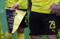 Football Soccer - Borussia Dortmund v AS Monaco - UEFA Champions League Quarter Final First Leg - Signal Iduna Park, Dortmund, Germany - 12/4/17 Borussia Dortmund's Marcel Schmelzer holds a pennant with yesterdays date on before the match Reuters / Kai Pfaffenbach Livepic