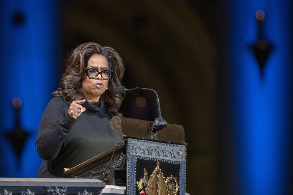 FILE - In this Nov. 21, 2019 file photo, Oprah Winfrey speaks during the Celebration of the Life of Toni Morrison at the Cathedral of St. John the Divine in New York. Winfrey says her friend Gayle King is facing death threats following a social media backlash caused by an interview with WNBA star Lisa Leslie that concerned the late Kobe Bryant. Winfrey said on Hoda & Jenna & Friends, Friday, Feb. 7, 2020, that King “is not doing well'' and has to travel with security because of threats. (AP Photo/Mary Altaffer, File)