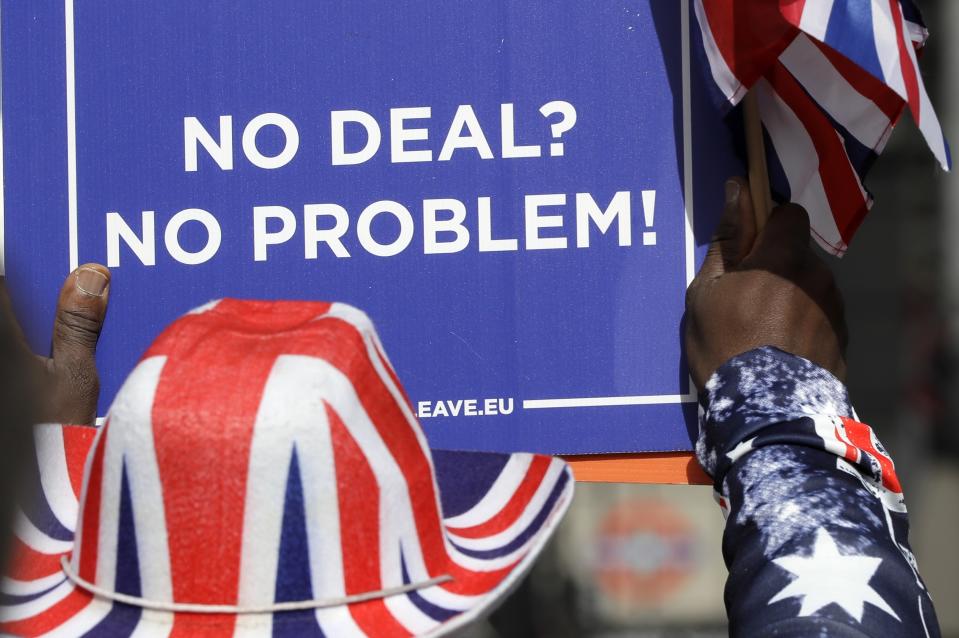 A pro-Brexit leave the European Union supporter takes part in a protest outside the House of Parliament in London, Wednesday, March 13, 2019. The European Parliament's chief Brexit official says he wants to limit any Brexit deadline extension to a few months at best, fearing it will take over the whole European election campaign. (AP Photo/Kirsty Wigglesworth)