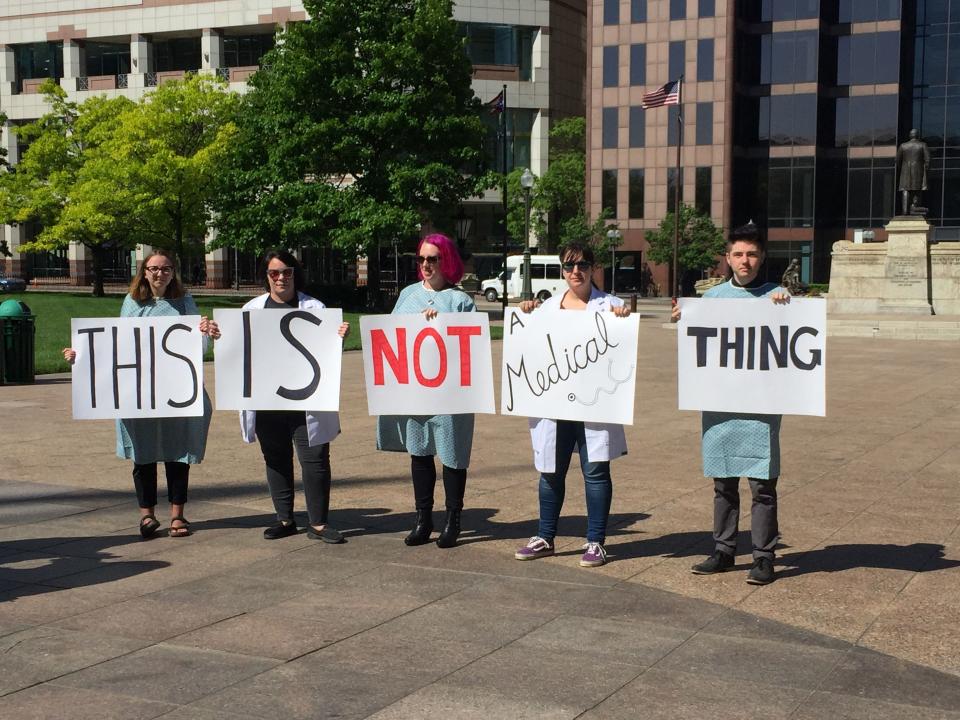 Protesters oppose a bill to require women seeking abortions be informed of a "reversal" method.