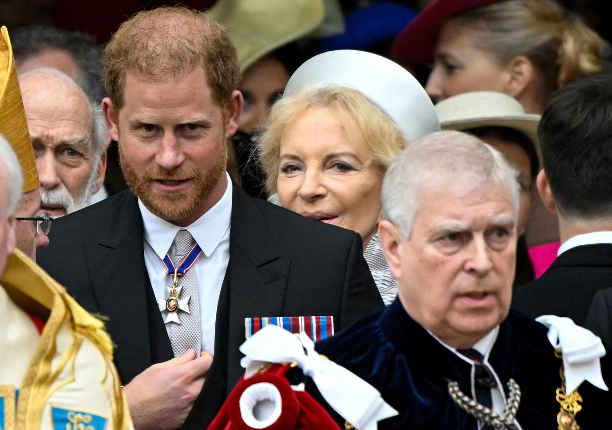 Prince Harry sits third row, behind other royals, at the coronation. (Photo: TOBY MELVILLE / POOL / AFP) (Photo by TOBY MELVILLE/POOL/AFP via Getty Images)