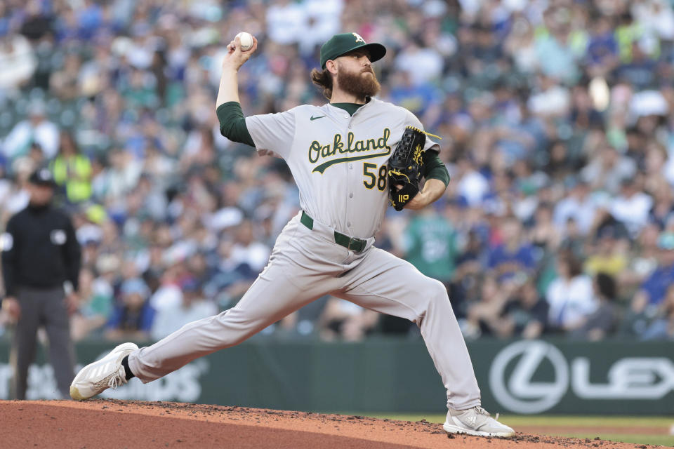 Oakland Athletics starting pitcher Paul Blackburn (58) throws during the third inning of a baseball game against the Seattle Mariners, Friday, May 10, 2024, in Seattle. (AP Photo/Jason Redmond)