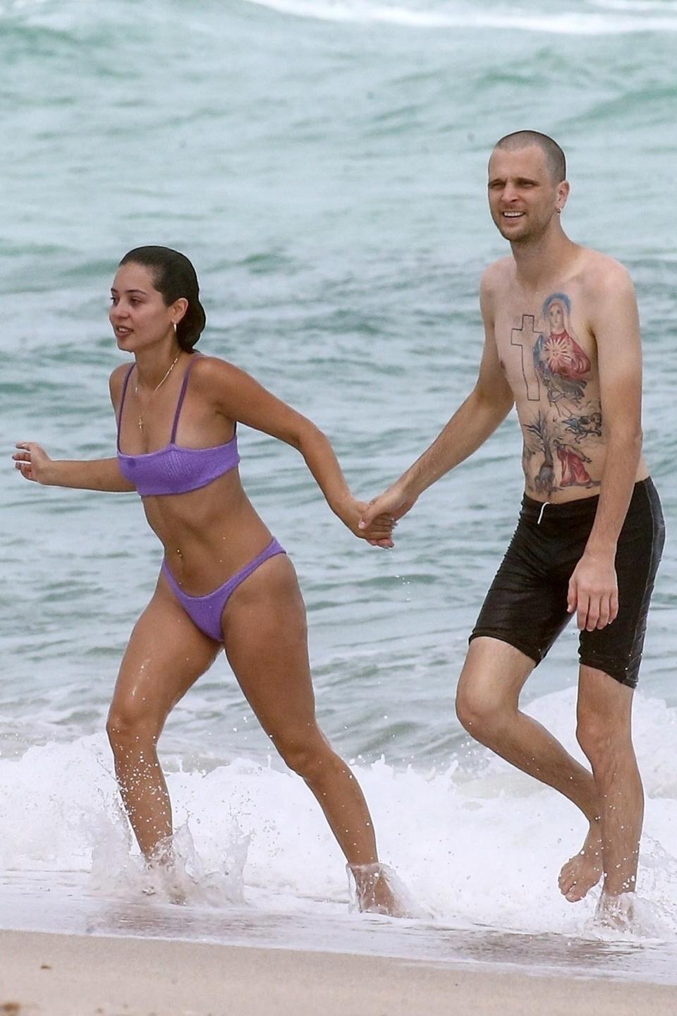 the couple getting out of the ocean