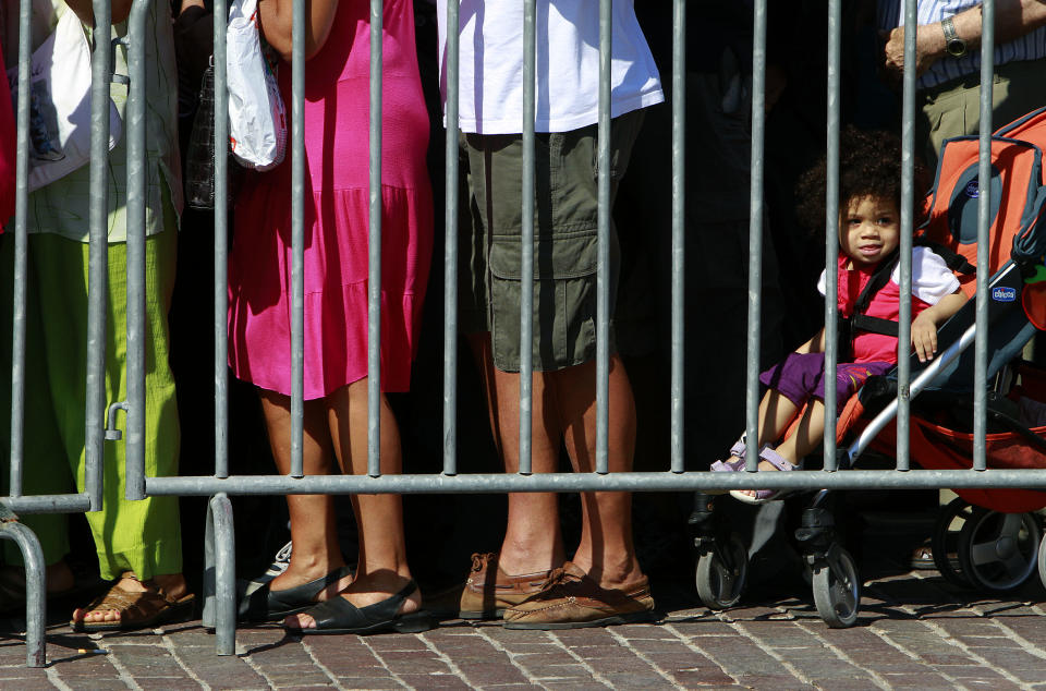 People wait in line to receive free vegetables in Athens, June 20, 2012. Hundreds of poverty-stricken Greeks are queuing for free vegetable handouts as politicians try to finalize a potential power-sharing deal that would end weeks of political uncertainty. Leaders of three parties backing the debt-crippled country's bailout commitments will meet separately Wednesday to try and finalize a coalition agreement. (AP Photo/Petros Karadjias)