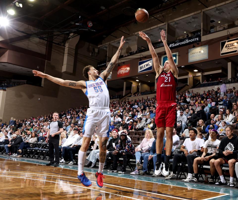 Cole Swider #21 of the Sioux Falls Skyforce shoots a three point basket against the Oklahoma City Blue during a 2023-24 playoff game at the Sanford Pentagon on April 4, 2024 in Sioux Falls, South Dakota.