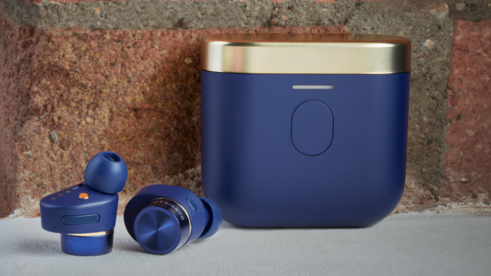 The Bowers & Wilkins Pi7 S2 in-ear wireless headphones, in Midnight Blue, with matching case.