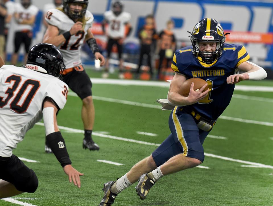 Shea Ruddy of Whiteford makes one of many moves during a long run against Ubly. Whiteford beat Ubly 26-20 in the Division 8 State Championships at Ford Field Friday.