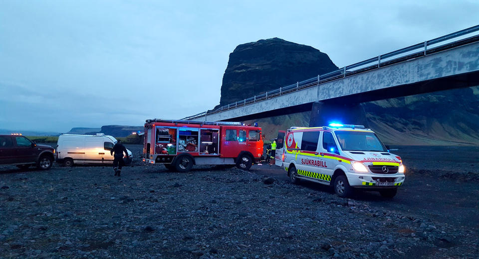 Emergency services at the scene of the crash in Skeidararsandur, Iceland. (Adolf Erlingsson via AP)