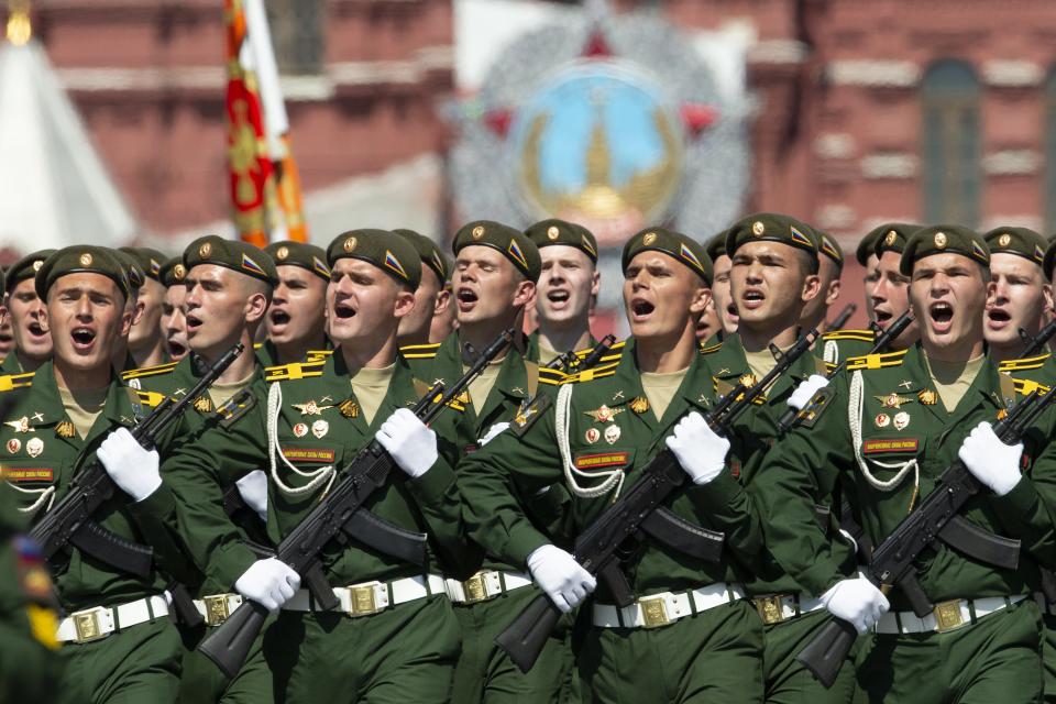 Russian soldiers shout hooray as they march in Red Square during the Victory Day military parade marking the 75th anniversary of the Nazi defeat in WWII, in Moscow, Russia, Wednesday, June 24, 2020. The Victory Day parade normally is held on May 9, the nation's most important secular holiday, but this year it was postponed due to the coronavirus pandemic. (AP Photo/Alexander Zemlianichenko)