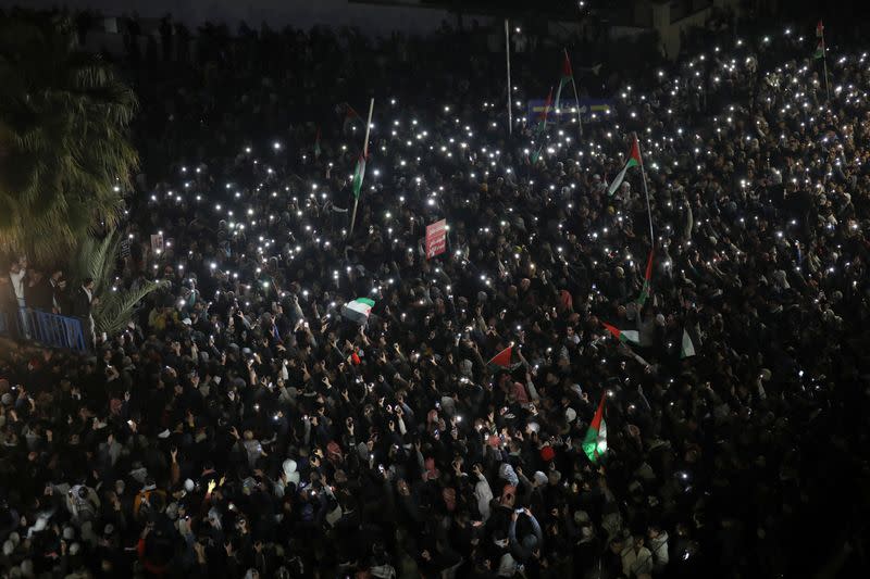People hold a protest in support of Palestinians in Gaza, amid the ongoing conflict between Israel and the Palestinian Islamist group Hamas, in Amman