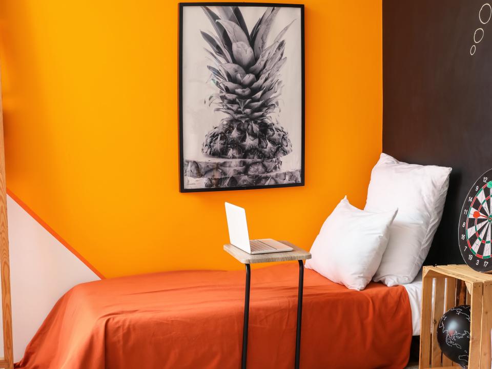 Orange wall and bedding