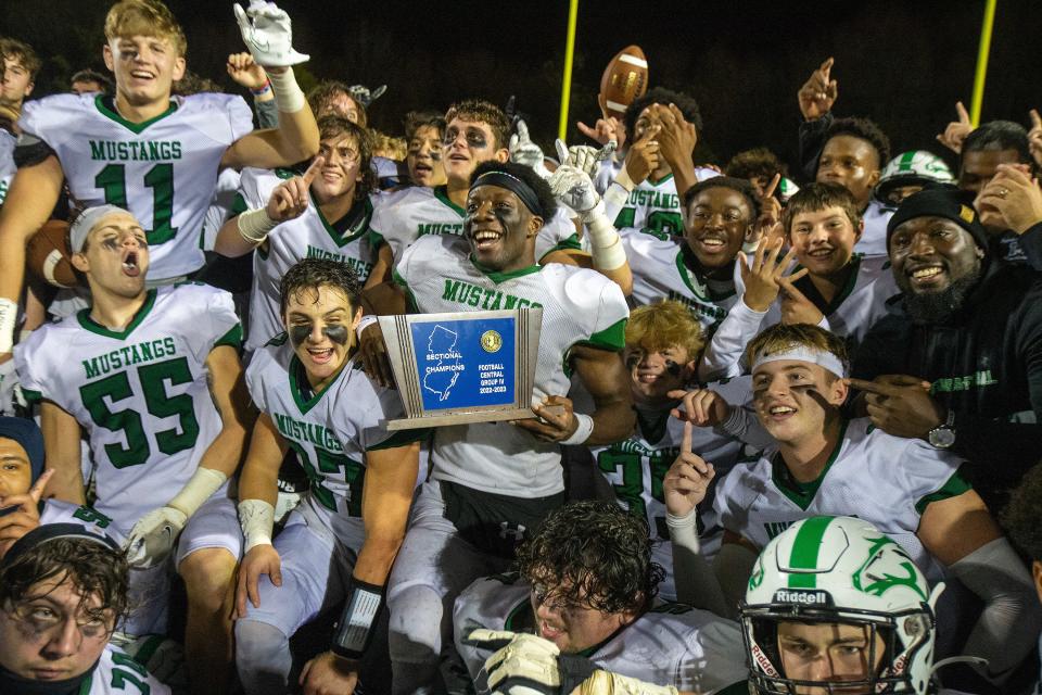 Mainland celebrates their win against Middletown South during the NJSIAA Central Group 4 championship football game at Middletown High School South in Middletown, NJ Friday, November 11, 2022. 