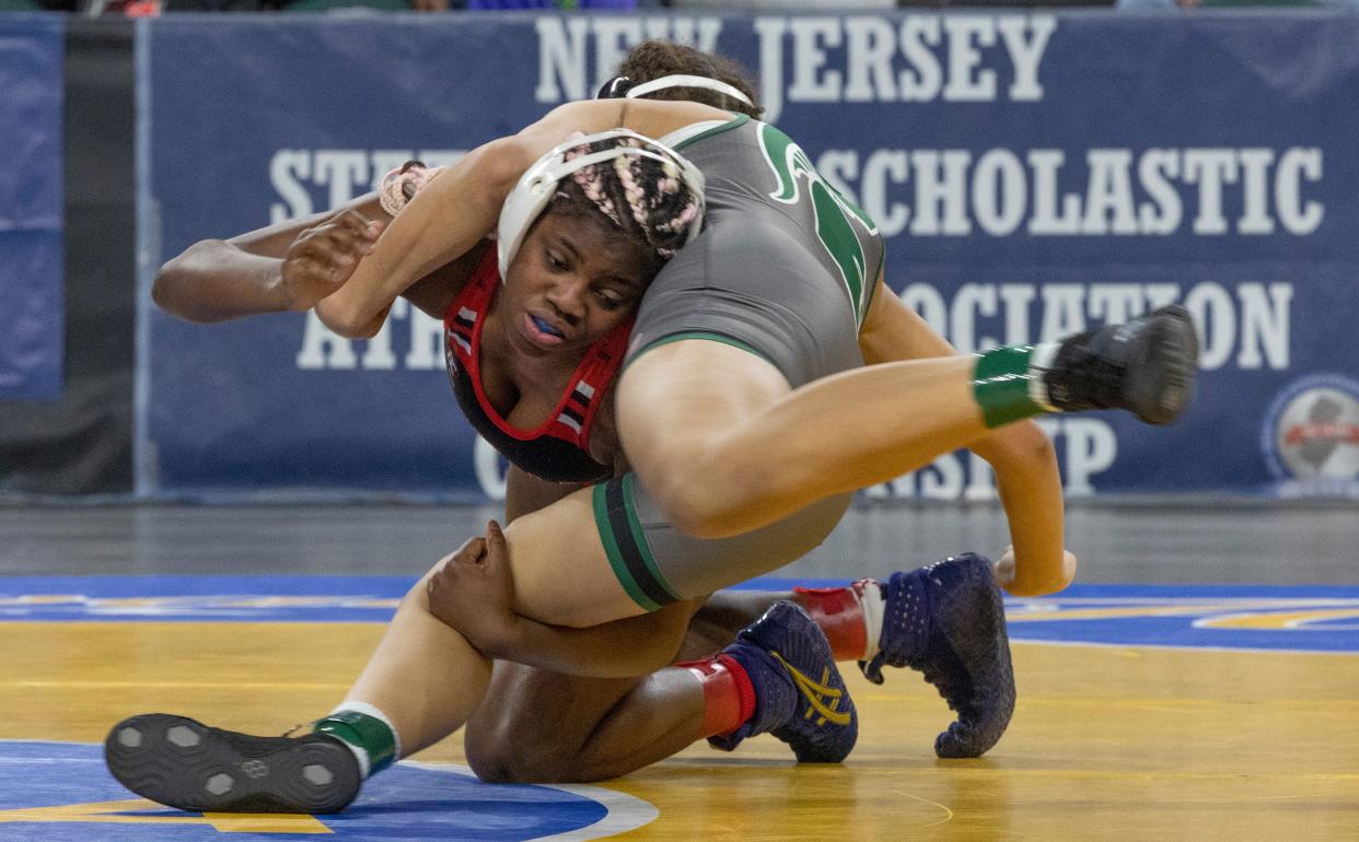 Olivia Geroges defeated Saniyah Queen of St. Thomas Aquinas 9-5 in their 145 lbs. bout.  NJSIAA State Wrestling Championships in Atlantic City on March 4, 2023. 