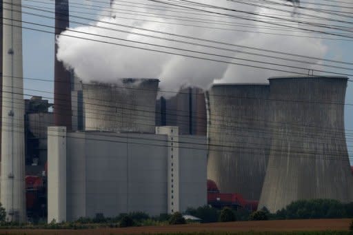 Exhaust rises from cooling towers at the Neurath lignit coal-fired power station in Grevenbroich, Germany. Nearly 200 nations launched a fresh round of United Nations climate talks in Doha faced with appeals for urgency in their efforts to reduce Earth-warming greenhouse gas emissions