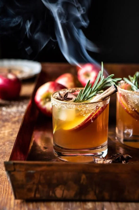 <p>Half Baked Harvest</p><p>Margaritas aren't only for summer anymore. This cozy take on the classic combines smoky mezcal with orange liquor, spiced apple cider, a hint of lime, and sweet maple syrup. </p><p><strong>Get the recipe: <a href="https://www.halfbakedharvest.com/smoky-harvest-apple-cider-margaritas/" rel="nofollow noopener" target="_blank" data-ylk="slk:Smoky Harvest Apple Cider Margarita;elm:context_link;itc:0;sec:content-canvas" class="link rapid-noclick-resp">Smoky Harvest Apple Cider Margarita</a></strong></p>