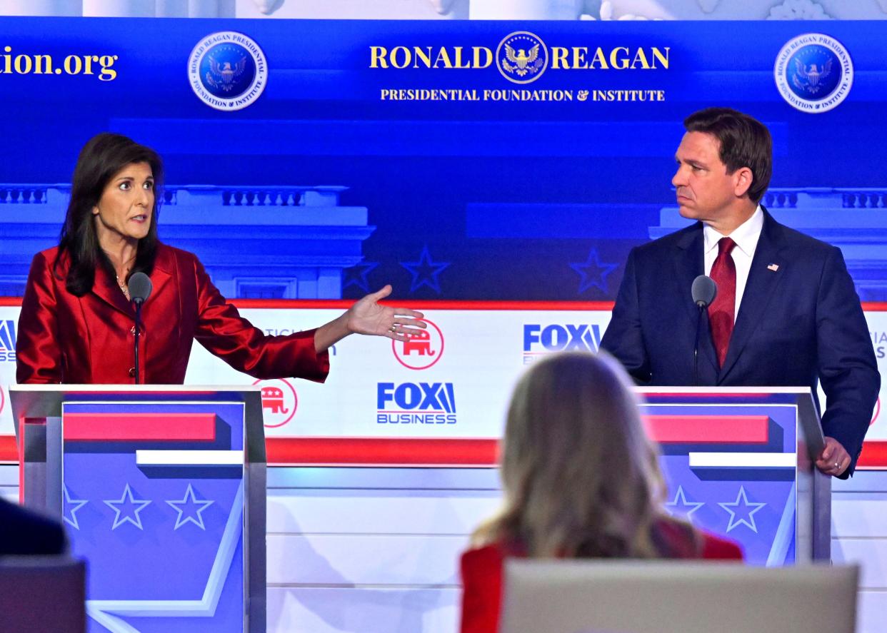 (From left) Former South Carolina Gov. Nikki Haley and Florida Gov. Ron DeSantis debate during the FOX Business Republican presidential primary debate at the Ronald Reagan Presidential Library and Museum.