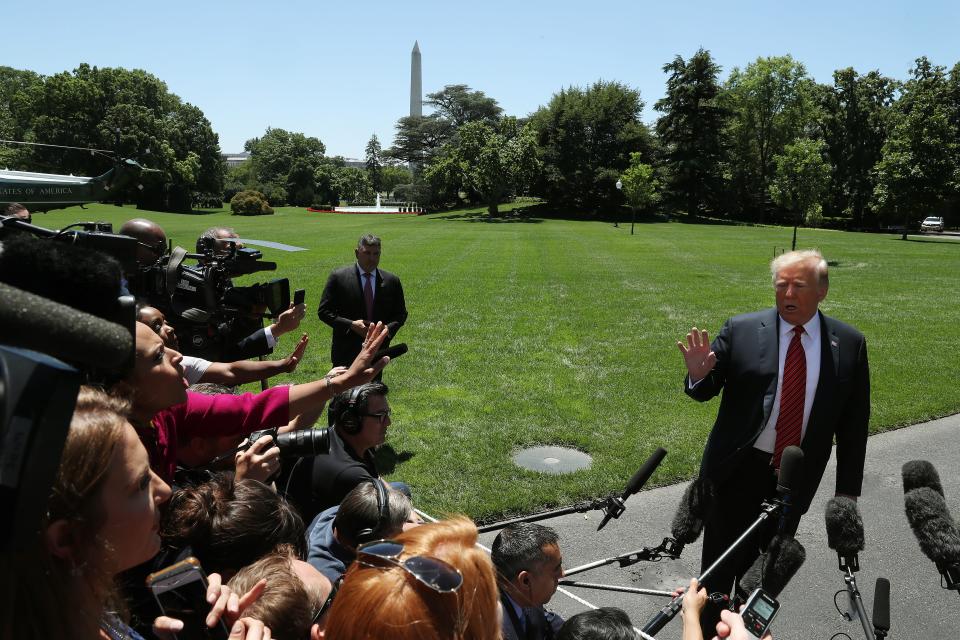 President Donald Trump speaks to reporters before departing for Iowa on June 11, 2019.