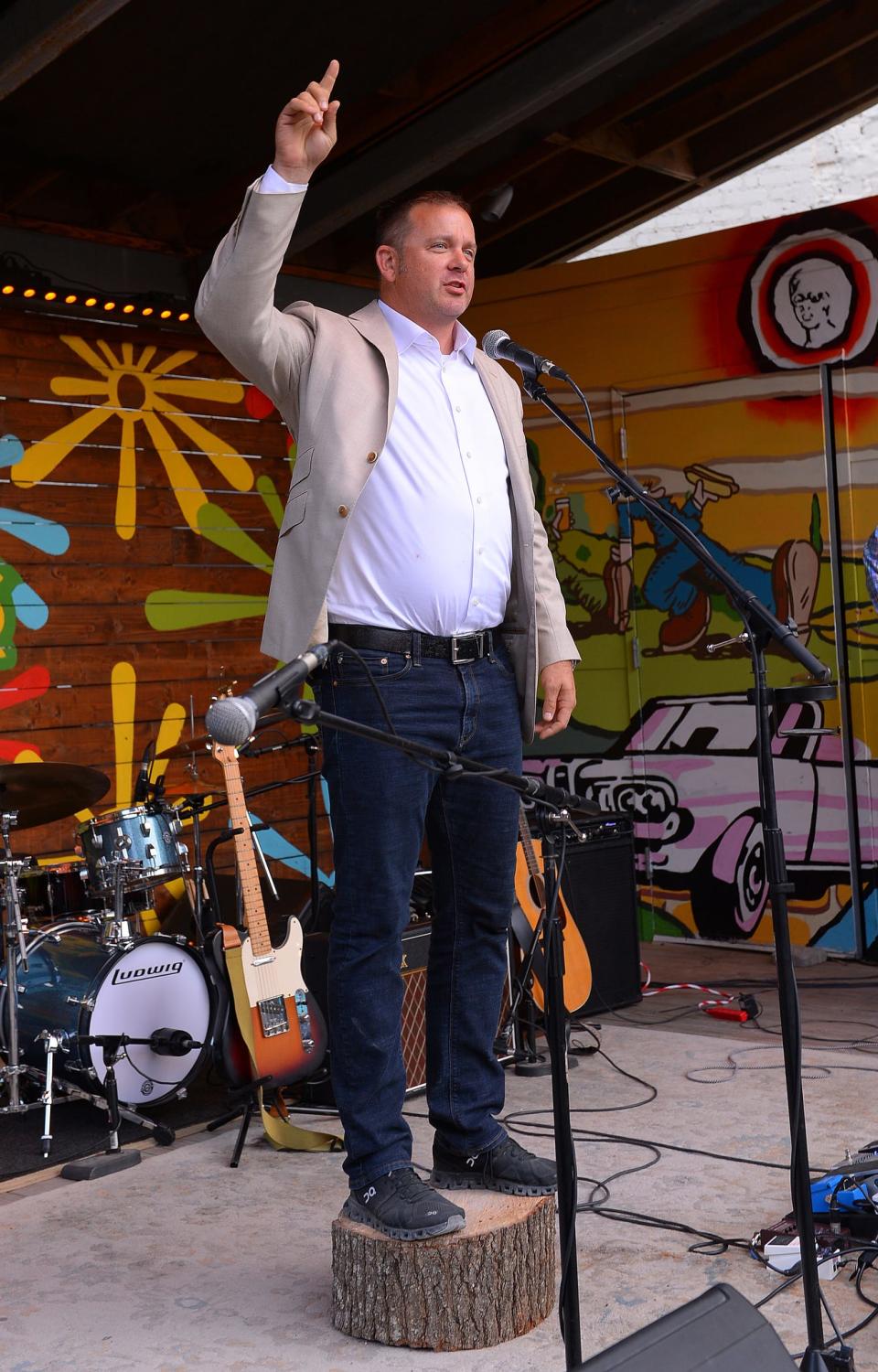 Candidates running for the upcoming state and local primary election speak during the Stump the Yard event held at FR8yard in downtown Spartanburg, Monday evening, June 6, 2022. Travis Bedson, candidate for State Superintendent of Education, speaks during the event.
