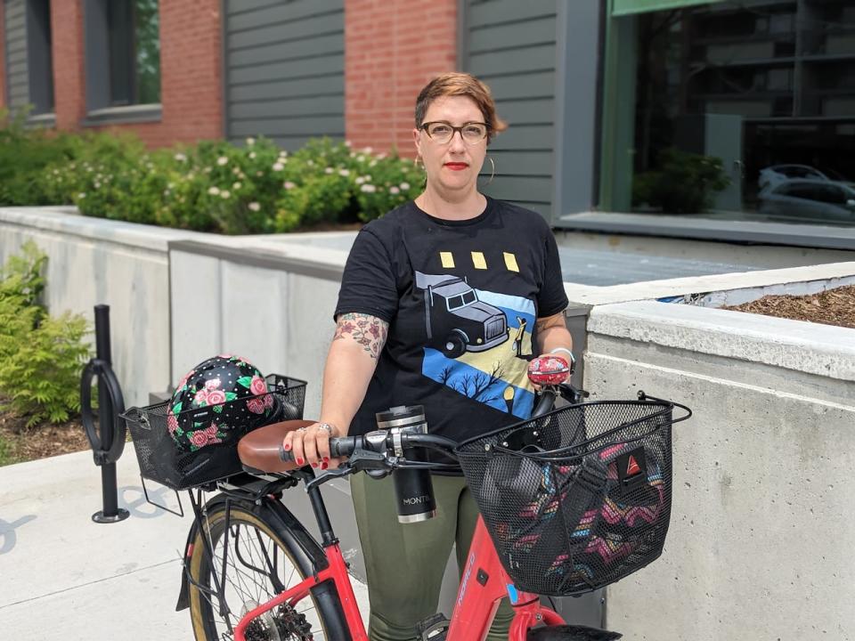 Somerset ward councillor Ariel Troster poses for a photograph at the corner of Gladstone Avenue and Rochester Street after a collision between a cyclist and a dump truck on June 16, 2023.