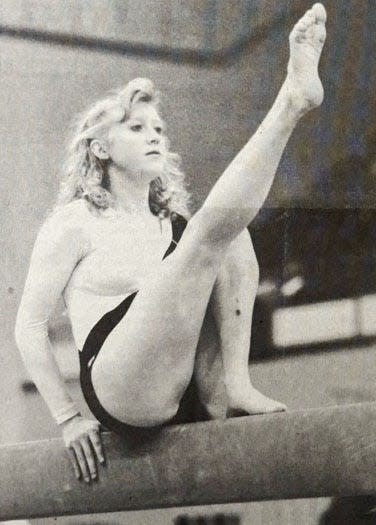 Deuel-Sioux Valley gymnasts Amy Schrader competes on the balance beam during the 1992 state high school gymnastics meet in the Watertown Civic Arena.