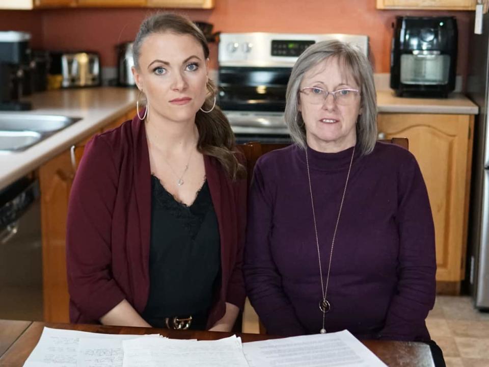 Shanna Halleran's sister, Stacey Halleran, left, and their mother, Barb Houlihan, have questions about how the Royal Newfoundland Constabulary handled an investigation into her 2019 death. (Ariana Kelland/CBC - image credit)